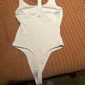 ALO Yoga Tank in White One-Piece Bodysuit